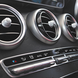 air-condition vents and buttons in a car 